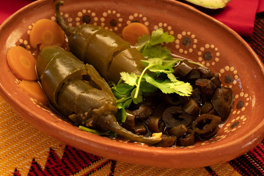 Jalapeno And Fire Roasted Chiles In Clay Dish