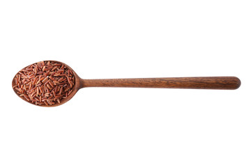 Brown rice in spoon isolated on white, top view