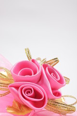 Artificial pink rose bouquet with copyspace for text