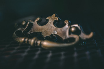 brass handle on metal mesh table