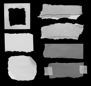 Set of torn paper texture on black background, copy space.