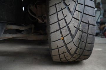 Naklejka na ściany i meble Car's tire detail