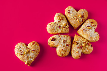 Heart shaped cookies for valentines day on pink background
