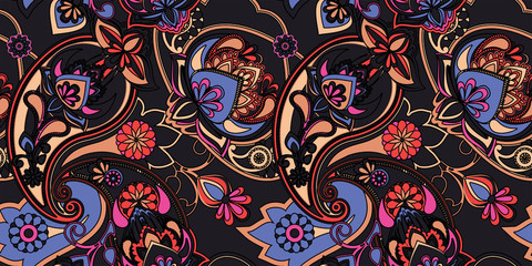 Decorative seamless pattern for fabric, tapestry, wallpaper and backgrounds in the style of a traditional oriental paisley pattern.