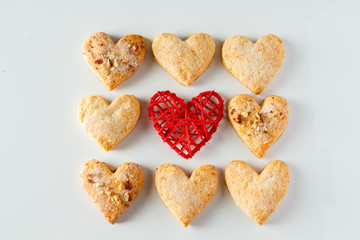 Heart shaped cookie pattern on a white background