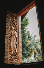 Majestic engraving on side panel of window 
