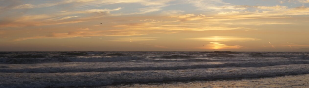 sunset on beach © adamentia