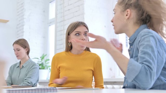 Angry Female Creative Team having Argument in Office