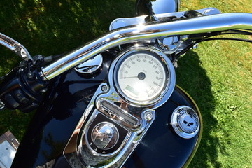 A contrast of iron color on the handlebars details of the motorbike part body