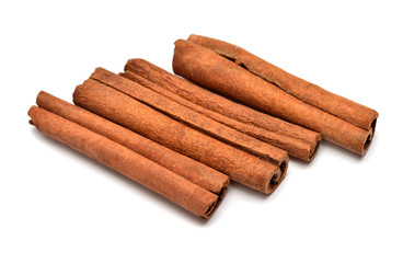 Cinnamon sticks isolated on a white background. Perfectly retouched, full depth of field on the photo. Top view, flat lay