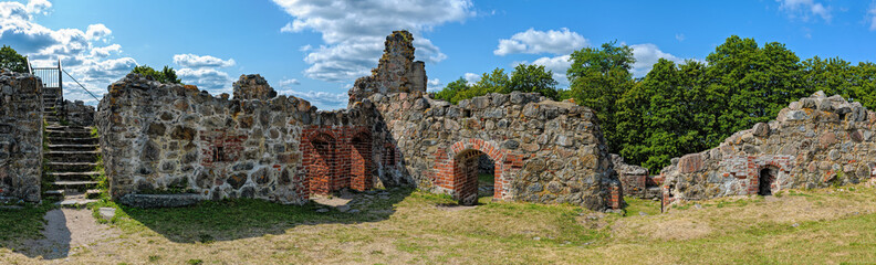 Fototapeta na wymiar Ruins of the medieval Bishop’s Castle on the island of Kuusisto in Kaarina, Finland, near Turku, at sunny summer day.