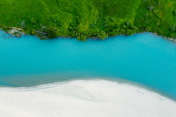 Fototapeta na wymiar View from above to glacier water stream, Glenorchy, New Zealand