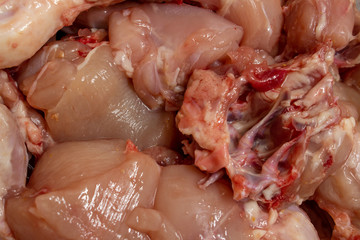 Raw chicken pieces fresh from butcher shop. Curry cut pieces for gravy.