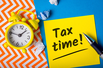 Tax time -15th April 15 - Tax day in USA. Notification of the need to file tax returns, tax form at...