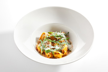 Tortellini with Perch and Tomato Sauce in Restaurant Isolated