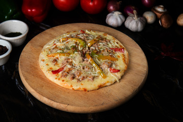 raw pizza prepared for baking