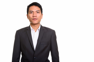 Portrait of young Asian businessman in suit