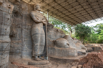 Beautiful standing Buddha and Reclining Buddha at Gal Vihara in Polonnaruwa ancient city of Sri Lanka. Gal Vihara is a group of four beautiful Buddhas in perfect condition, cut from granite rock.