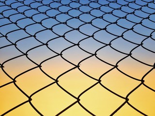 Steel cage during sunset and blue Sky background