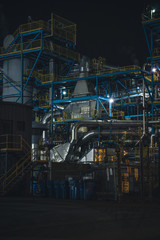 pipes machinery and turbine at a plant