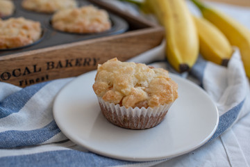 Homemade banana muffins on the wooden table