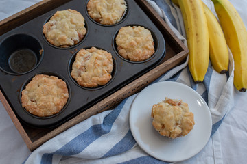 Homemade banana muffins on the wooden table