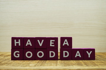Have a Good Day text message on wooden background