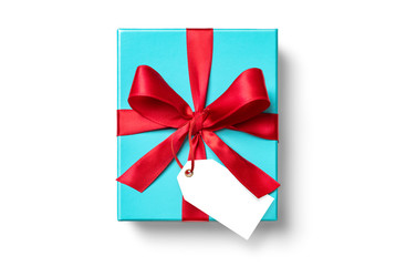 赤いリボンをかけたブルーグリーンのプレゼントボックス