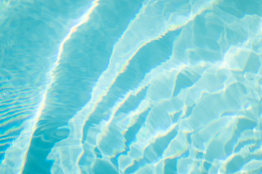 Close-up of vibrant aqua swimming pool water