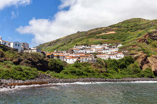 Beautiful Vila do Corvo in the summer sun in the middle of the Atlantic Ocean.