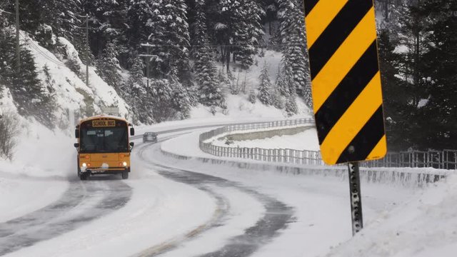School Bus Driving During A Snow Storm