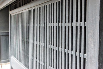 A lattice window of old and traditional Japanese townhouse in Nara, Japan