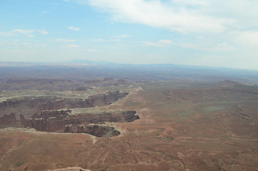 Early Summer in Utah: White Rim, Monument Basin, Colorado River Canyon and Abajo Mountains Seen From Grand View Point in the Island in the Sky District of Canyonlands National Park