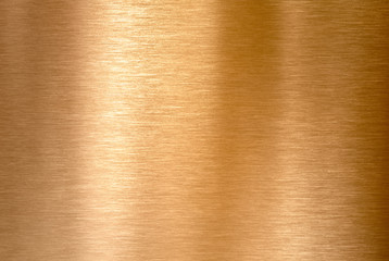 Copper or bronze brushed metal background or texture