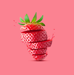 Creative concept with flying Strawberry. Sliced orange pink background. Levity fruit floating in...