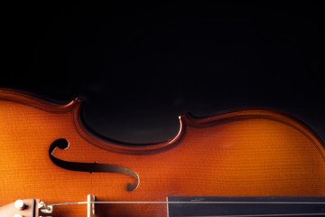 Beautiful antique violin on black background