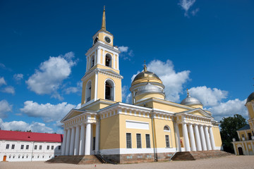 Fototapeta na wymiar Epiphany Cathedral and bell tower. Nilo-Stolobenskaya Pustyn. Is situated on Stolobny Island in Lake Seliger. Tver region, Russia