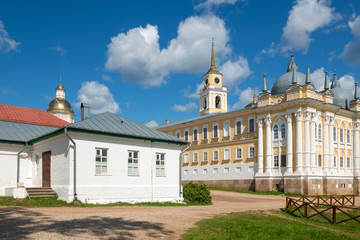 Fototapeta na wymiar The building of the monastery hotel. Nilo-Stolobenskaya Pustyn. Is situated on Stolobny Island in Lake Seliger. Tver region, Russia