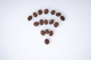 Coffee beans that forms a wifi symbol or signal isolated on white