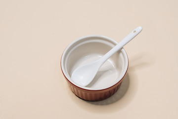 Close-up view of single empty white bowl ready for breakfast