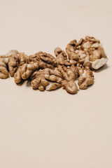 shelled walnuts in glass bowl, healthy eating concept