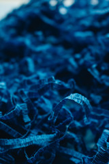 macro photo of blue paper decor material
