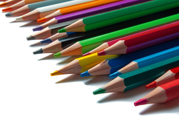 multicolored pencils on a white background.