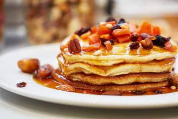 pancakes with nuts, honey and dried apricots