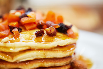 pancakes with nuts, honey and dried apricots