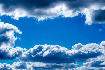 Blurred. Natural frame of clouds on a bright Sunny day. Natural background. Copy space
