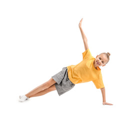 Little girl practicing yoga on white background