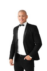 Stylish African-American man on white background