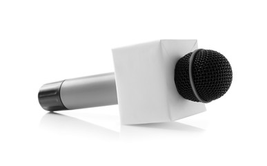 Journalist's microphone on white background
