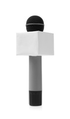 Journalist's microphone on white background